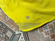 Load image into Gallery viewer, Size 10 Lululemon Yellow Hotty Hot Shorts
